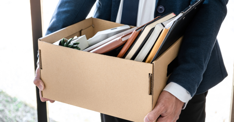 employee packing his things because of separation pay